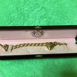 Juicy couture charm bracelet with box.
